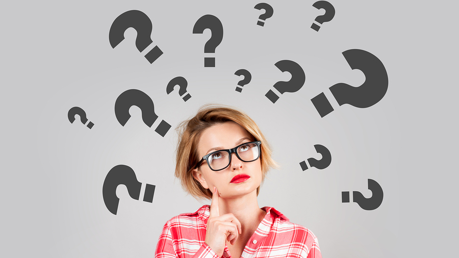 Thinking Women With Question Marks On White Background